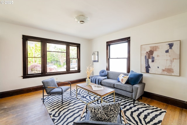 1818 N Killingsworth St, Portland, OR 97217 - living area featuring baseboards and wood finished floors
