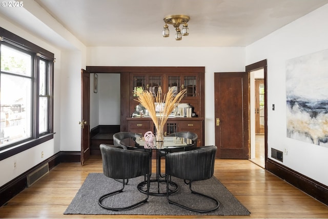 1818 N Killingsworth St, Portland, OR 97217 - dining area featuring light wood-style flooring and baseboards