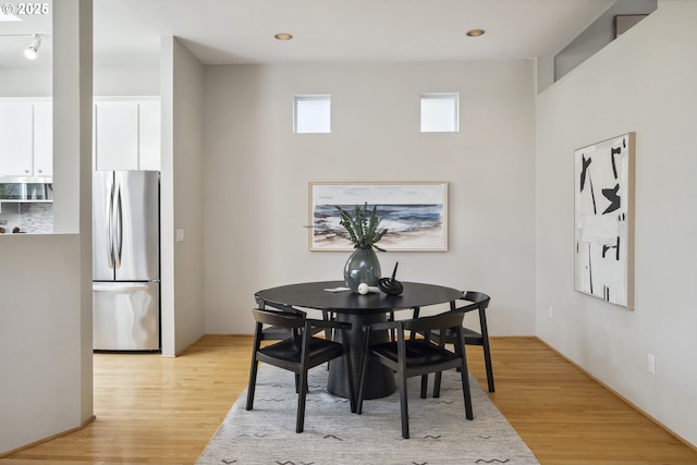 1369 SW Broadway Dr, Portland, OR 97201 - dining space featuring light wood-type flooring and recessed lighting