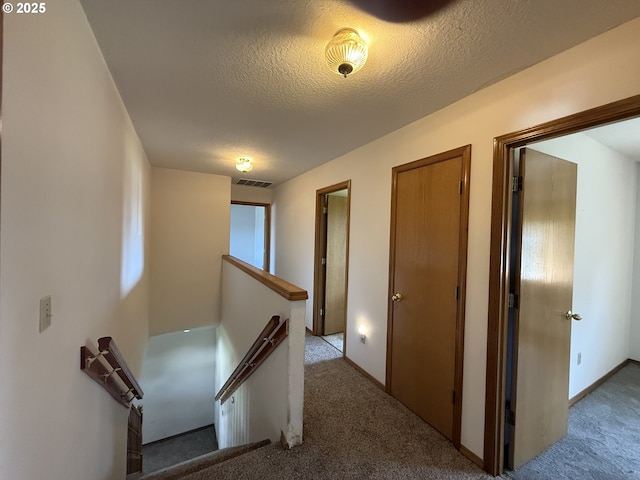 16117 NE 87th St, Vancouver, WA 98682 - hallway featuring an upstairs landing, carpet floors, a textured ceiling, and baseboards