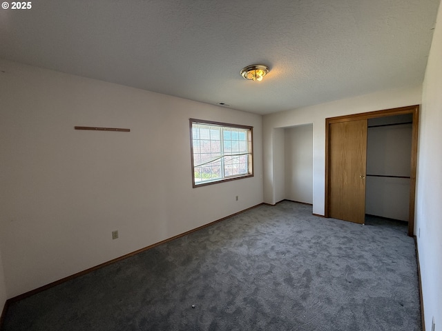16117 NE 87th St, Vancouver, WA 98682 - unfurnished bedroom featuring carpet, baseboards, two closets, and a textured ceiling