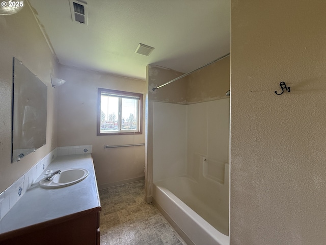 16117 NE 87th St, Vancouver, WA 98682 - full bath with vanity, baseboards, and shower / bath combination