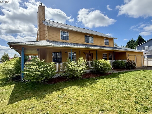16117 NE 87th St, Vancouver, WA 98682 - view of front facade with a garage, a porch, a chimney, metal roof, and a front lawn