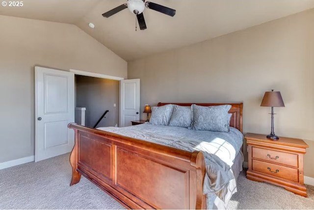 547 Front St, Rockaway Beach, OR 97136 - bedroom with ceiling fan, light colored carpet, and vaulted ceiling