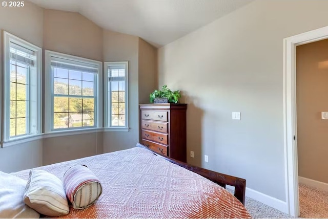 547 Front St, Rockaway Beach, OR 97136 - carpeted bedroom with vaulted ceiling