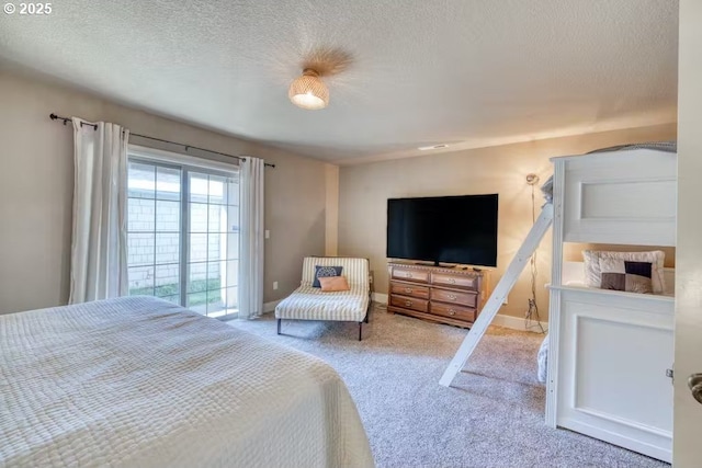 547 Front St, Rockaway Beach, OR 97136 - bedroom with carpet flooring and a textured ceiling