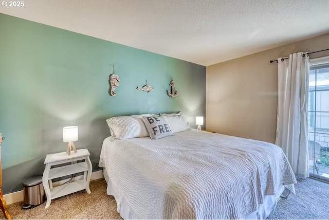 547 Front St, Rockaway Beach, OR 97136 - carpeted bedroom featuring a textured ceiling