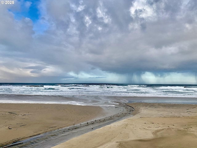 547 Front St, Rockaway Beach, OR 97136 - water view with a view of the beach