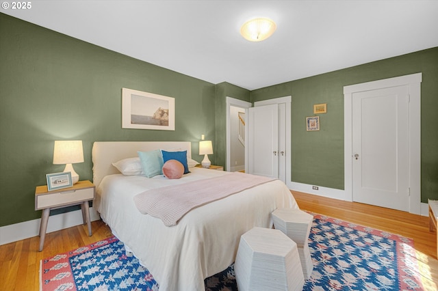 2603 NE 11th Ave, Portland, OR 97212 - bedroom with light wood finished floors and baseboards