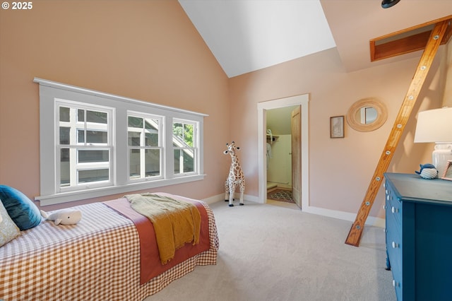 2603 NE 11th Ave, Portland, OR 97212 - carpeted bedroom with high vaulted ceiling and connected bathroom