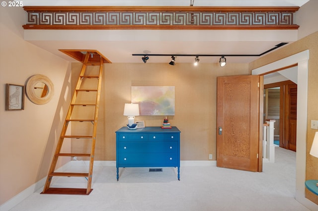 2603 NE 11th Ave, Portland, OR 97212 - carpeted bedroom with track lighting and baseboards