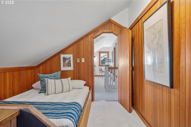 2603 NE 11th Ave, Portland, OR 97212 - bedroom with vaulted ceiling, carpet, and wood walls