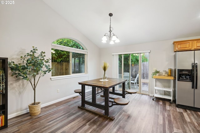 1230 W Fairview Dr, Springfield, OR 97477 - dining space with wood finished floors, a chandelier, and high vaulted ceiling
