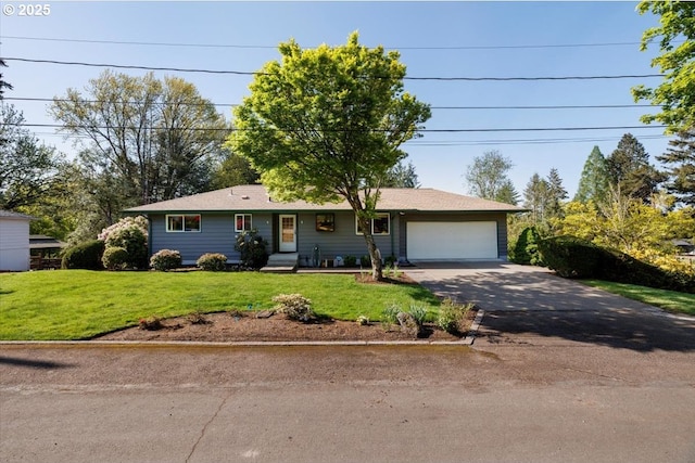 ranch-style home featuring an attached garage, a front yard, and aphalt driveway