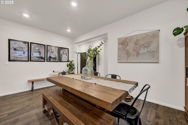 dining space featuring dark wood-style floors, baseboards, and recessed lighting