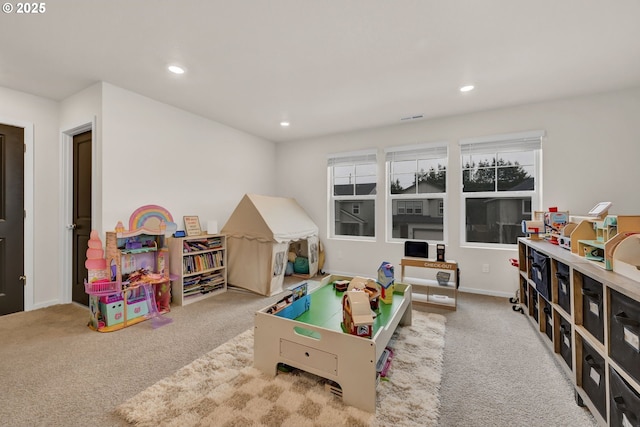 recreation room featuring carpet, baseboards, and recessed lighting