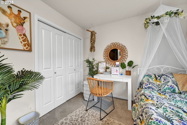 carpeted bedroom with a closet