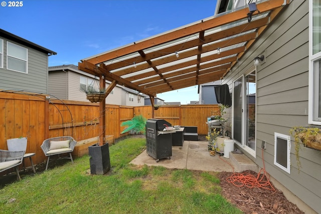 view of yard with a fenced backyard, a pergola, and a patio