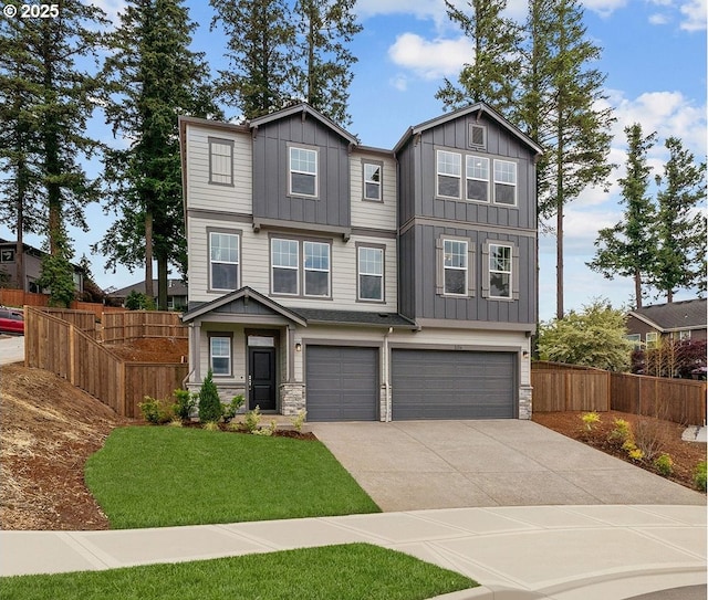 2134 Eleanor Rd, West Linn, OR 97068 - craftsman-style house featuring stone siding, concrete driveway, board and batten siding, and a garage
