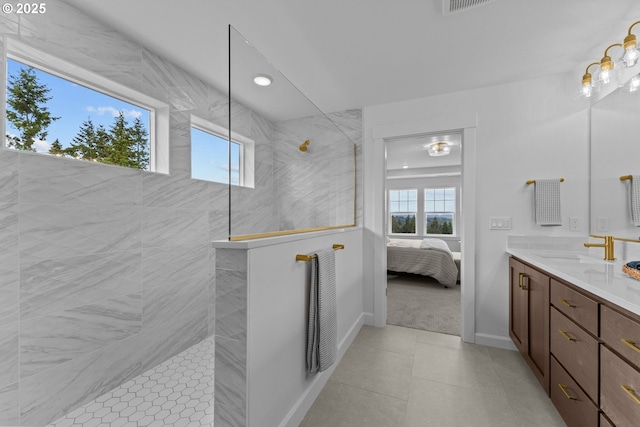 2134 Eleanor Rd, West Linn, OR 97068 - ensuite bathroom with plenty of natural light, walk in shower, double vanity, baseboards, and recessed lighting