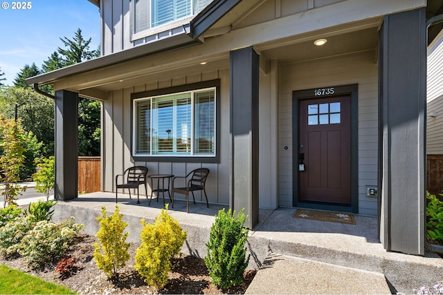 16735 SW Darling Ln, Portland, OR 97224 - entrance to property featuring a porch and board and batten siding