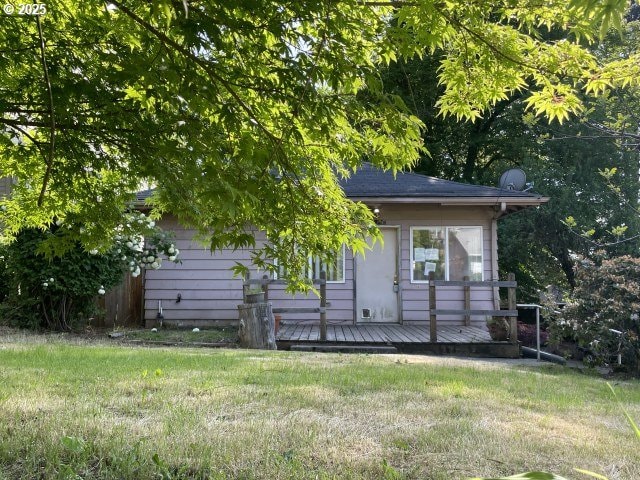 7224 SW 3rd Ave, Portland, OR 97219 - rear view of house with a deck and a shingled roof