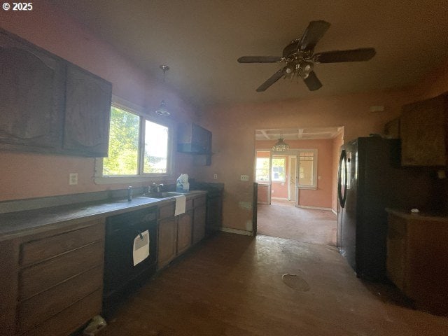 7224 SW 3rd Ave, Portland, OR 97219 - kitchen featuring a ceiling fan and black dishwasher