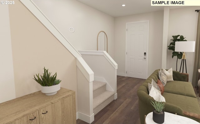 stairway with hardwood / wood-style floors