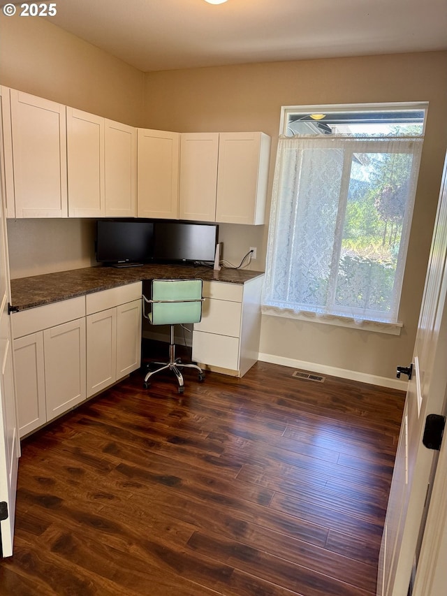 94703 Johnson Rd, Marcola, OR 97454 - unfurnished office featuring built in desk and dark wood-style flooring