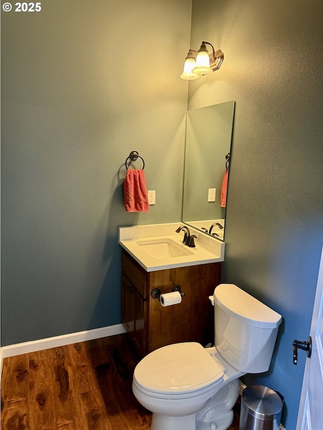94703 Johnson Rd, Marcola, OR 97454 - half bathroom featuring vanity and wood finished floors