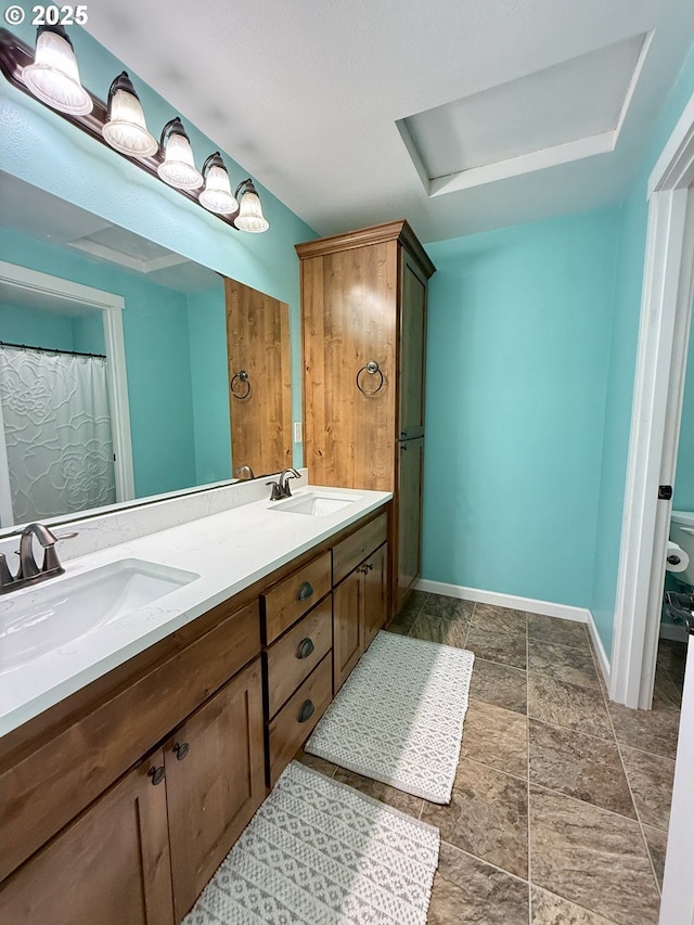 94703 Johnson Rd, Marcola, OR 97454 - bathroom featuring double vanity and stone finish floors
