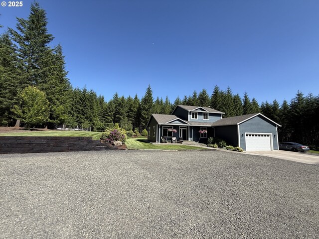 94703 Johnson Rd, Marcola, OR 97454 - view of front facade with an attached garage and driveway