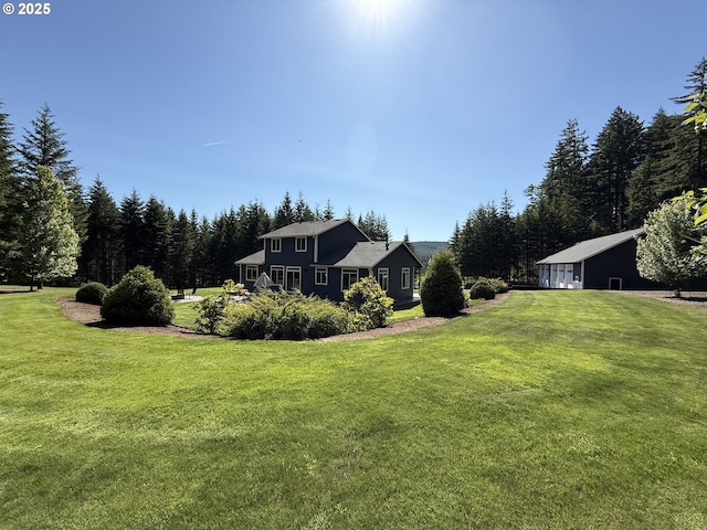 94703 Johnson Rd, Marcola, OR 97454 - view of green lawn with a garage
