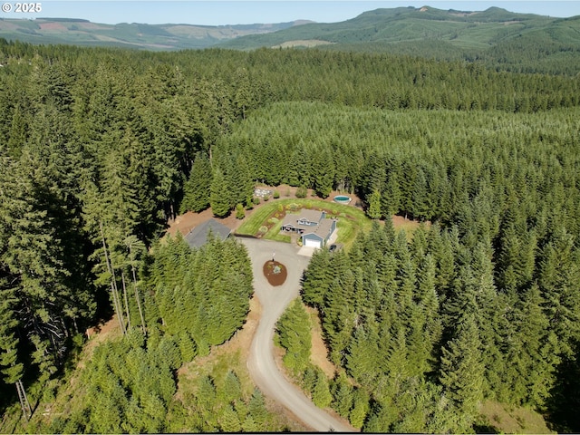 94703 Johnson Rd, Marcola, OR 97454 - aerial view of a heavily wooded area and a mountainous background