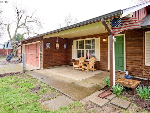 1301 49th Ave, Salem, OR 97317 - porch featuring a garage and driveway