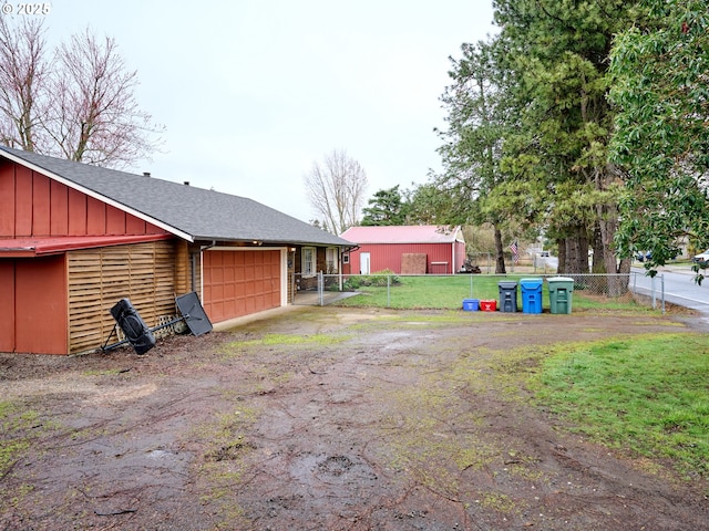 1301 49th Ave, Salem, OR 97317 - view of yard with driveway and an attached garage