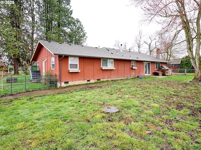 1301 49th Ave, Salem, OR 97317 - rear view of property with board and batten siding and crawl space
