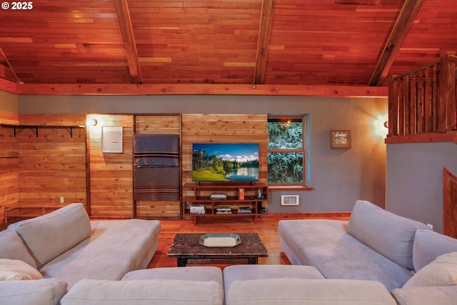 living room with wood ceiling, lofted ceiling with beams, and hardwood / wood-style flooring