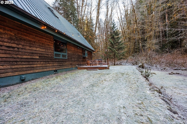 view of yard with a wooden deck