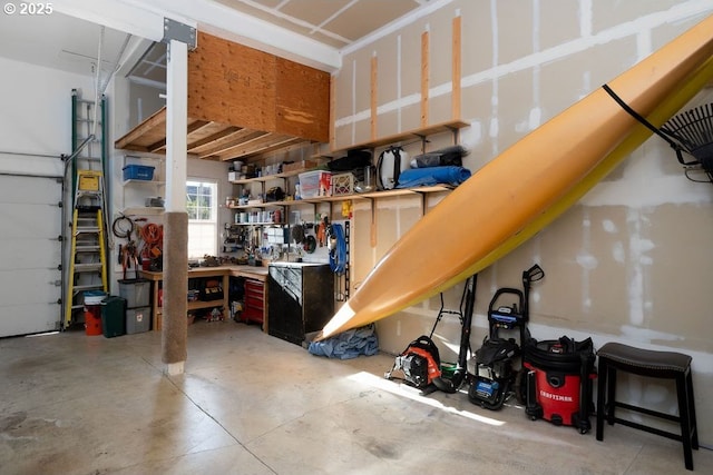 garage with a workshop area