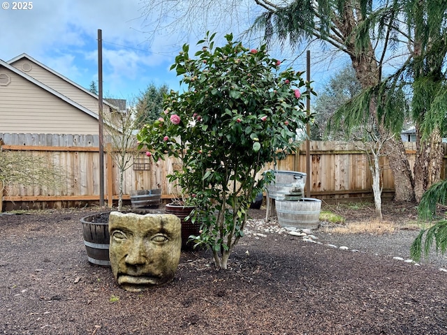 view of yard featuring fence