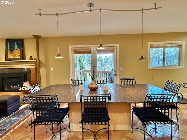 dining area featuring a fireplace