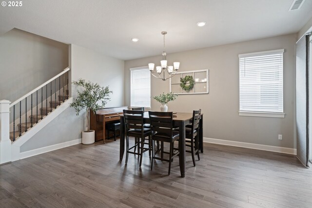 4744 S 19th St, Ridgefield, WA 98642 - dining room featuring wood finished floors, stairs, a chandelier, baseboards, and recessed lighting