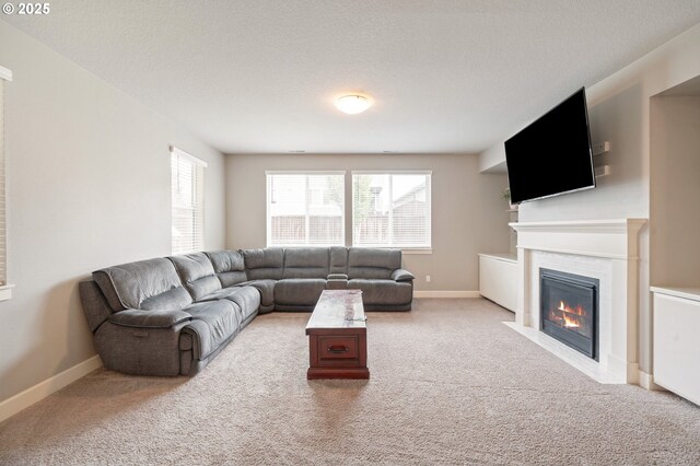 4744 S 19th St, Ridgefield, WA 98642 - carpeted living room with a fireplace with flush hearth and baseboards