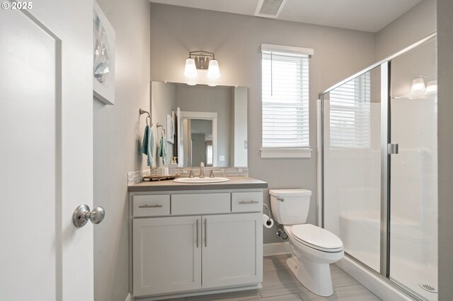 4744 S 19th St, Ridgefield, WA 98642 - full bath with a shower stall, toilet, baseboards, and vanity