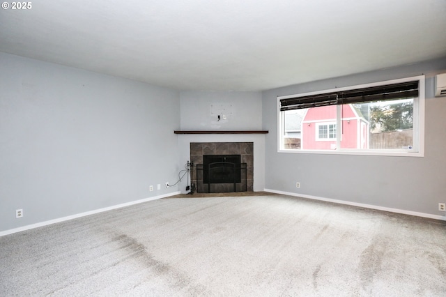 unfurnished living room featuring carpet floors and a tile fireplace