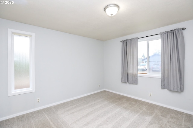 spare room with carpet flooring