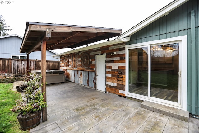 view of patio featuring a hot tub