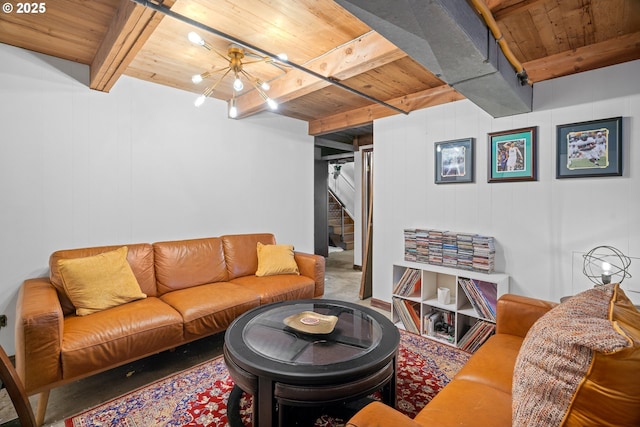 living area featuring a chandelier, wooden ceiling, beam ceiling, and stairway
