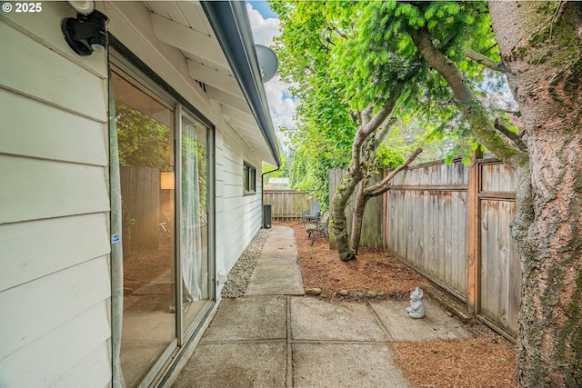 view of property exterior featuring fence